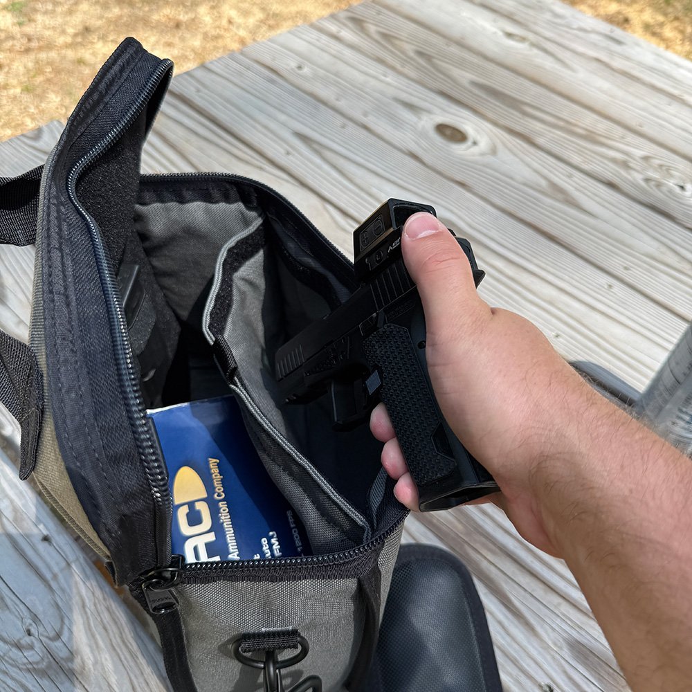 The padded pistol compartment inside the Lunch Box